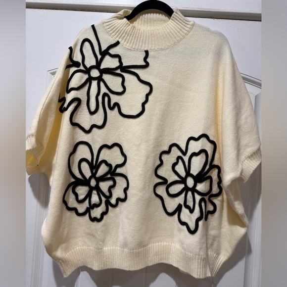 Easel Cream mock neck Sweater with Black Floral Accents - Picture 1 of 7